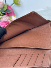 Load image into Gallery viewer, Louis Vuitton Zippy Wallet Midsize Monogram SKU6704